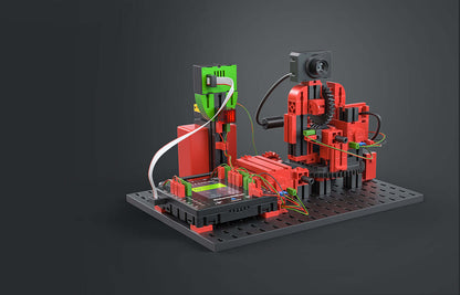 Add On STEM Coding Ultimate IoT set for robotics with vibrant red and green components on a black base.