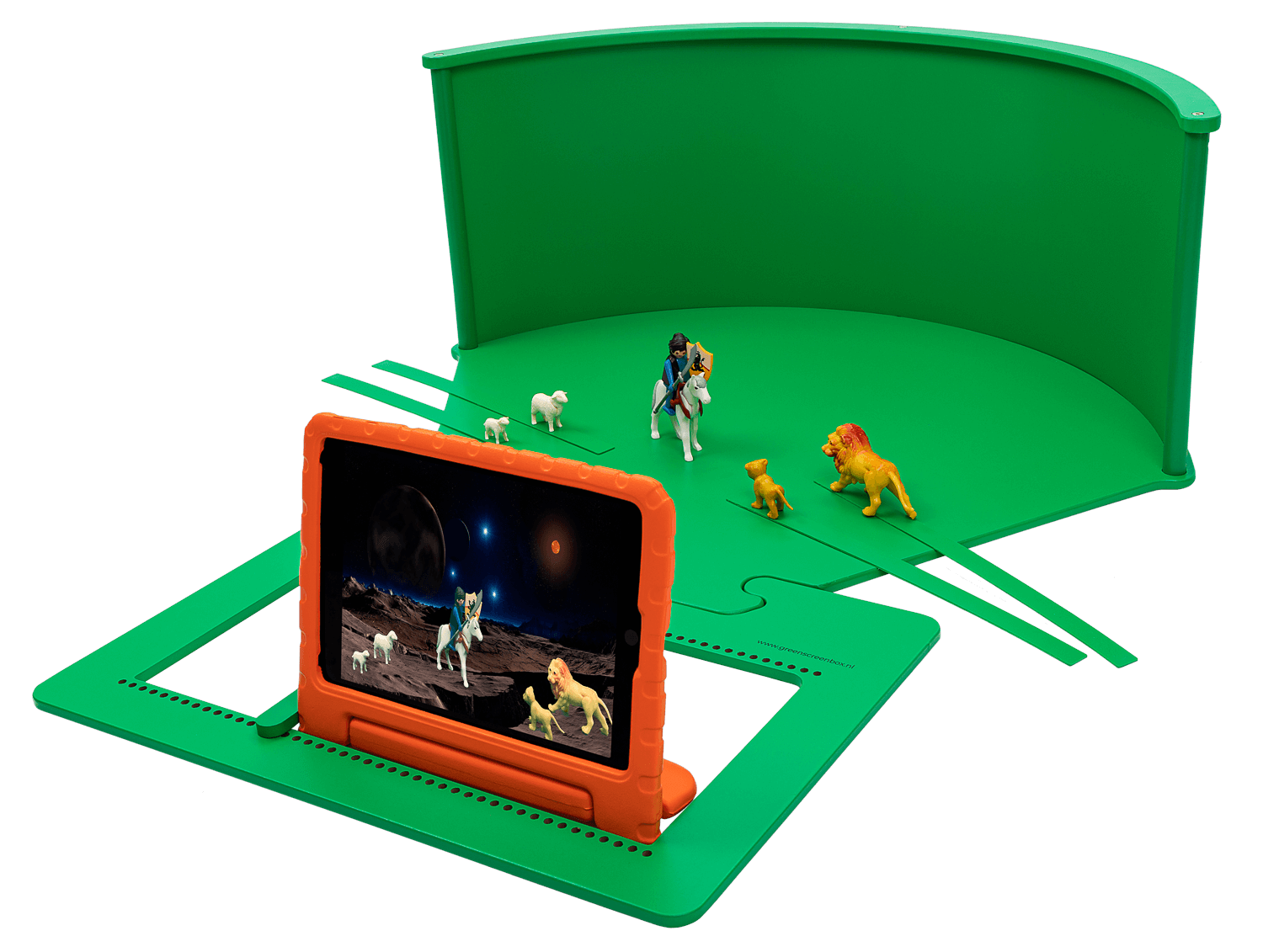 Child-friendly greenscreen setup with toy figures for imaginative role-play and digital creativity.