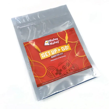 Makey Makey Get Up + Go! Booster Kit packaging featuring interactive electronics for active projects.