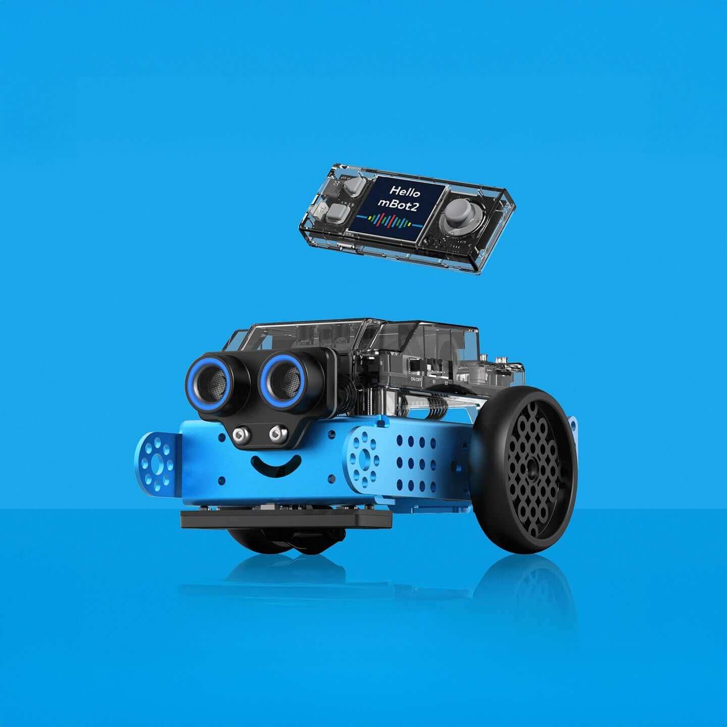 Blue educational robot with eyes and smiling face, showcasing a microcontroller module above it.