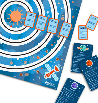 OzoGoes to the Solar System game board with planet cards, promoting STEAM learning and exploration of the solar system.