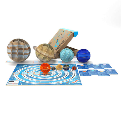 OzoGoes to the Solar System kit featuring planets, game board, and educational materials for STEAM learning.