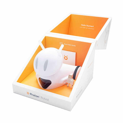 Photon Robot EDU in its box with a quick start guide, designed for teaching coding and various subjects.