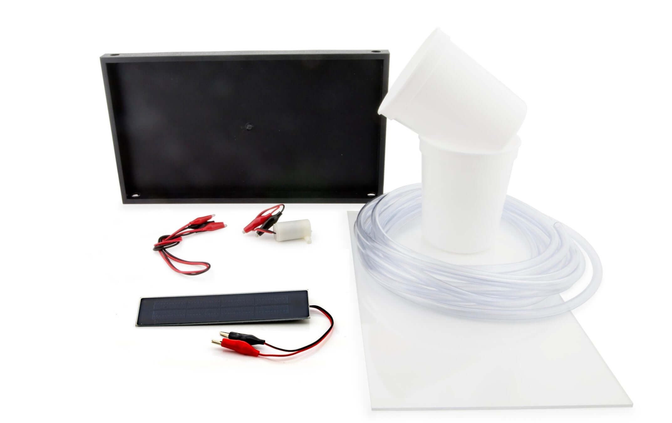Components of Solar Thermal Exploration Kit including solar panel, tubing, cups, and wiring.