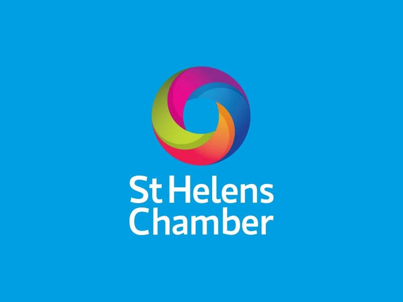 Colorful logo of St Helens Chamber against a blue background, symbolizing local business support and community.