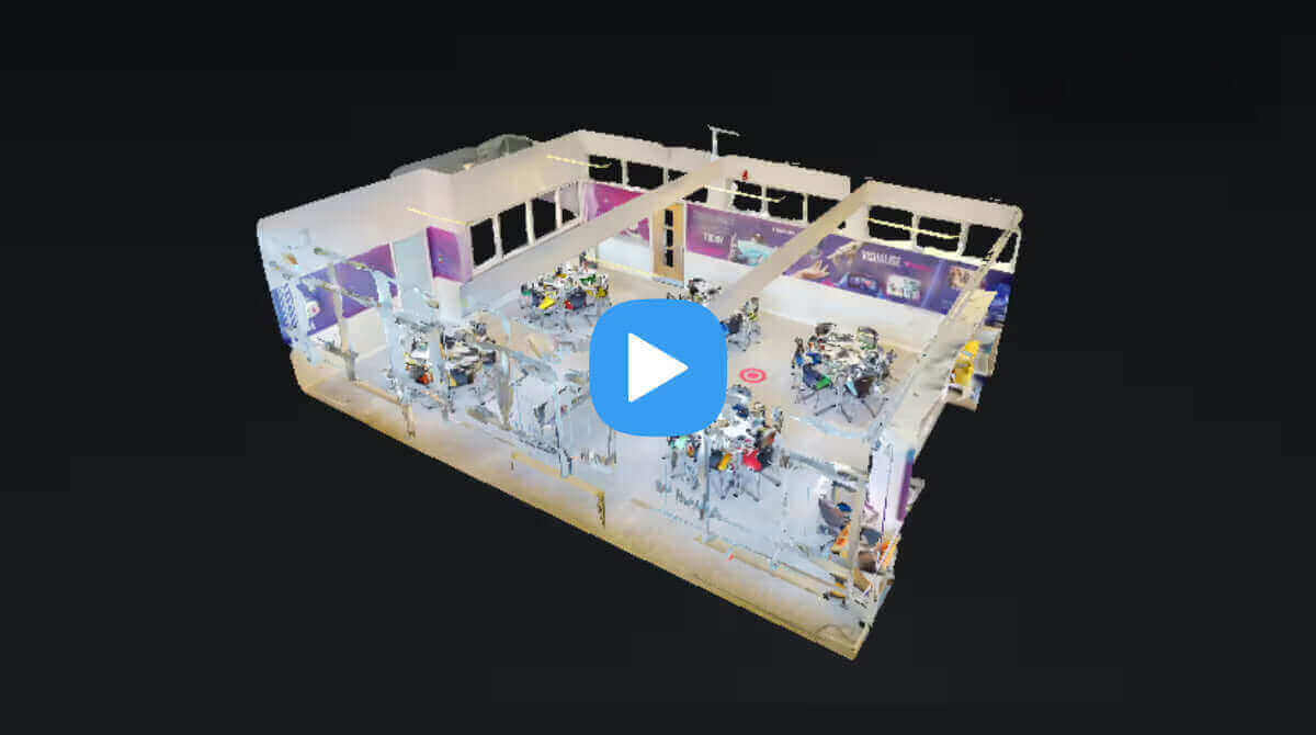 3D virtual tour of a modern office layout with workstations and meeting areas.